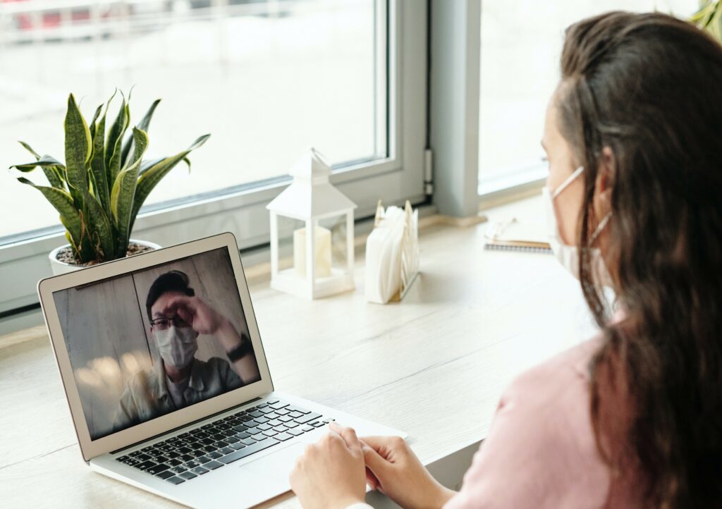 Lady in a video call with a man 